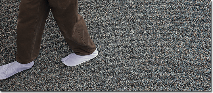 Walking on the raked gravel while wearing cloth tabi with thin plastic soles. The footprints are barely noticeable.