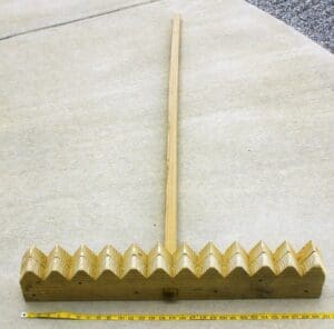 The original wooden rake was provided by the garden designer and builder, Kurisu International – 30 inches (76cm) wide with 12 teeth. The original wooden rake was provided by the garden designer and builder, Kurisu International – 30 inches (76cm) wide with 12 teeth.